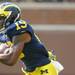 Senior wide receiver Kelvin Grady returns a kick during the football game against Western Michigan at Michigan Stadium in Ann Arbor, Mich. on Sept. 3, 2011. Angela J. Cesere | AnnArbor.com
