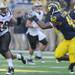 Senior linebacker J.B. Fitzgerald runs to try to stop Western Michigan running back Tevin Drake during the football game at Michigan Stadium in Ann Arbor, Mich. on Sept. 3, 2011. Angela J. Cesere | AnnArbor.com