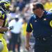 Michigan head coach Brady Hoke walks out on the field with the team before the football game against Western Michigan at Michigan Stadium in Ann Arbor, Mich. on Sept. 3, 2011. Angela J. Cesere | AnnArbor.com