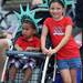 Ypsilanti residents Sarah Thomm, age 5, right, stands with her brother David, age 2, with Statue of Liberty hats on during the Ypsilanti Fourth of July parade. Angela J. Cesere | AnnArbor.com