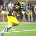 Junior running back Vincent Smith runs the ball during the football game against Notre Dame on Sept. 10, 2011. Angela J. Cesere | AnnArbor.com