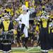 Michigan Marching Band Drum Major Jeffrey McMahon jumps during the band's pregame show during the football game against Notre Dame on Sept. 10, 2011. Angela J. Cesere | AnnArbor.com