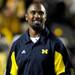 Former Michigan football player Charles Woodson stands on the sidelines during the football game against Notre Dame on Sept. 10, 2011. Angela J. Cesere | AnnArbor.com
