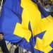 A Michigan cheerleader runs the flag down the field during the football game against Notre Dame on Sept. 10, 2011. Angela J. Cesere | AnnArbor.com