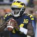 Junior quarterback Denard Robinson looks for a pass during the football game against Notre Dame on Sept. 10, 2011. Angela J. Cesere | AnnArbor.com