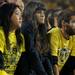 From left: Michigan student Ammy Yuan, Michigan alumna Alex Costakis, and Michigan student Jordan Bachar look disappointed after a Notre Dame touchdown in the last minutes of the football game at Michigan Stadium on Sept. 10, 2011. Angela J. Cesere | AnnArbor.com