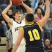 Chelsea's Hadley Truman, right, tries to block a pass by Dexter's Haden Quinn. Angela J. Cesere