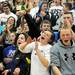 The Chelsea student section does a dance and cheers at the end of the first quarter. Angela J. Cesere
