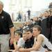 Dexter head coach Randy Swoverland talks to his team on the court from the bench during the game. Angela J. Cesere