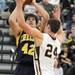 Dexter's Michael Mioduszewski, right, tries to block a shot by Chelsea's Michael Steinhauer. Angela J. Cesere