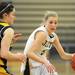 Chelsea's Lisa Keene, left, tries to block Dexter's Riley McDonald from moving forward with the ball. Angela J. Cesere