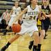 Dexter's Olivia Vollmers, left, drives toward the basket. Angela J. Cesere