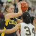 Chelsea's Grace Sauers, left, looks for a pass around Dexter's Teia McGaheyAngela J. Cesere