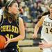 Chelsea's Grace Martin, left, stops to look for an opening while Dexter's Polly Washabaugh runs up to block her. Angela J. Cesere