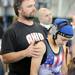Bellefontaine, Ohio, resident Harvey Hites, left, rubs the shoulders of his daughter, 12-year-old Taylor Hites, before her wrestling match at the United States Girls' Wrestling Association National Championships tournament at Eastern Michigan University. Angela J. Cesere | AnnArbor.com
