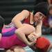Michigan girls wrestling team member Hannah Jewell, top, tries to force down Texas girls wrestling team member Lindsey Spjut during a high school age bracket match at the United States Girls' Wrestling Association National Championships tournament at Eastern Michigan University. Angela J. Cesere | AnnArbor.com
