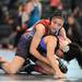 Michigan girls wrestling team member Paige Amy, top, tries to force down Colorado girls wrestling team member Marissa Galleqos during a middle school age bracket wrestling match at the United States Girls' Wrestling Association National Championships tournament at Eastern Michigan University. Angela J. Cesere | AnnArbor.com 