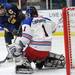 Grosse Pointe Woods University Liggett goalie Joseph Davenport, right, gets ready to block a shot by Chelsea's Joe Hewitt. Angela J. Cesere | AnnArbor.com

