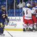 Grosse Pointe Woods University Liggett team members celebrate after a goal during the first period of the MHSAA semi-finals against Chelsea. Angela J. Cesere | AnnArbor.com
