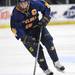 Chelsea's Joe Hewitt takes the puck down the ice. Angela J. Cesere | AnnArbor.com
