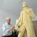 In his Saline studio, sculptor Tony Frudakis smoothes out the urethane foam that will be used to make a mold for a statue of Thomas Jefferson. The statue, which is being made for Thomas Jefferson High School in Council Bluffs Iowa, will be cast in bronze.  Angela J. Cesere | AnnArbor.com