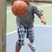 8-year-old Ann Arbor resident Macaih Humphries plays basketball during the 18th annual Juneteenth celebration at Wheeler Park. Angela J. Cesere | AnnArbor.com