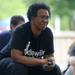 Ann Arbor resident Karen Simpson listens to the poetry of Leslie McGraw during the annual Juneteenth celebration at Wheeler Park. Angela J. Cesere | AnnArbor.com