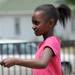 7-year-old Ypsilanti resident Nyla Hood walks while balancing an egg during a relay race at the 18th annual Juneteenth celebration. Angela J. Cesere | AnnArbor.com