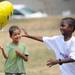 Ann Arbor residents Isaiah Howard, age 6, left, and Christopher Poplar, age 6, play with a balloon during the 18th annual Juneteenth celebration at Wheeler Park. Angela J. Cesere | AnnArbor.com