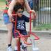 Ann Arbor resident Najda Robinson-Mayer helps her 5-year-old son Jacob shovel sand during the Juneteenth celebration. Angela J. Cesere | AnnArbor.com