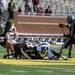 Michigan's Brian Greiner, center right, and Bellarmine's Austin Powell fight for the ball while their teammates stand by to support them. Angela J. Cesere | AnnArbor.com
