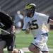 Bellarmine's Nate Blue, left, chases after Michigan's Will Meter as he runs toward the goal. Angela J. Cesere | AnnArbor.com
