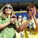Evelyn Rochelau, center, and Holly Rocheleau cheer for Michigan lacrosse player Rob Healy, who is their grandson and nephew (respectively). Angela J. Cesere | AnnArbor.com
