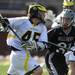 Michigan's Will Meter, left, tries to get past Bellarmine's Austin Powell. Angela J. Cesere | AnnArbor.com
