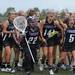 The Pioneer lacrosse team cheers after winning the MHSAA quarter finals match against Huron, 10 - 11 at South Lyon High School. Angela J. Cesere | AnnArbor.com