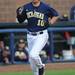 Michigan sophomore Michael O'Neill runs home on a hit from teammate Coley Crank during the baseball game against Coastal Carolina University at Wilpon Baseball Complex in Ann Arbor, Mich. on Tuesday evening. Angela J. Cesere | AnnArbor.com