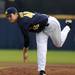 Michigan junior pitcher Bobby Brosnahan throws a pitch during the game against Coastal Carolina. Angela J. Cesere | AnnArbor.com