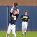 Michigan freshman Dylan Delaney catches a fly ball. Angela J. Cesere | AnnArbor.com