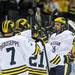 Michigan hockey teammates celebrate after Luke Moffatt scored Michigan's fourth goal of the night. Michigan defeated Miami Ohio 4 - 1. Angela J. Cesere | AnnArbor.com
