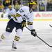 Michigan forward Alex Guptill takes the puck down the ice. Angela J. Cesere | AnnArbor.com
