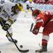 Michigan forward David Wohlberg, left, faces off against Miami of Ohio forard Blake Coleman. Angela J. Cesere | AnnArbor.com
