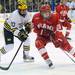 Michigan forward Travis Lynch, left, tries to block Miami of Ohio forward Bryon Paulazzo. Angela J. Cesere | AnnArbor.com
