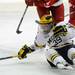 Michigan forward Lindsay Sparks tries to gain control of the puck from the ground. Angela J. Cesere | AnnArbor.com
