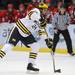 Michigan defenseman Jon Merrill gets ready to pass the puck. Angela J. Cesere | AnnArbor.com
