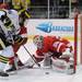 Michigan forward David Wohlberg, left, tries to score a goal on Miami of Ohio goalie Cody Reichard. Angela J. Cesere | AnnArbor.com
