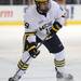 Michigan forward Derek DeBlois takes the puck down the ice. Angela J. Cesere | AnnArbor.com
