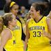 From left: Michigan guard Courtney Boylan, forward Cyesha Goree, and guard Carmen Reynolds are all smiles after their 79 -68 win over Northwestern. Angela J. Cesere | AnnArbor.com