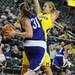 Michigan center Rachel Sheffer throws her arms out to block a pass by Northwestern forward Dannielle Diamant. Angela J. Cesere | AnnArbor.com