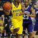 Michigan forward Nya Jordan looks for a pass underneath the basket. Angela J. Cesere | AnnArbor.com
