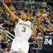 Michigan guard Trey Burke takes a shot. Angela J. Cesere | AnnArbor.com
